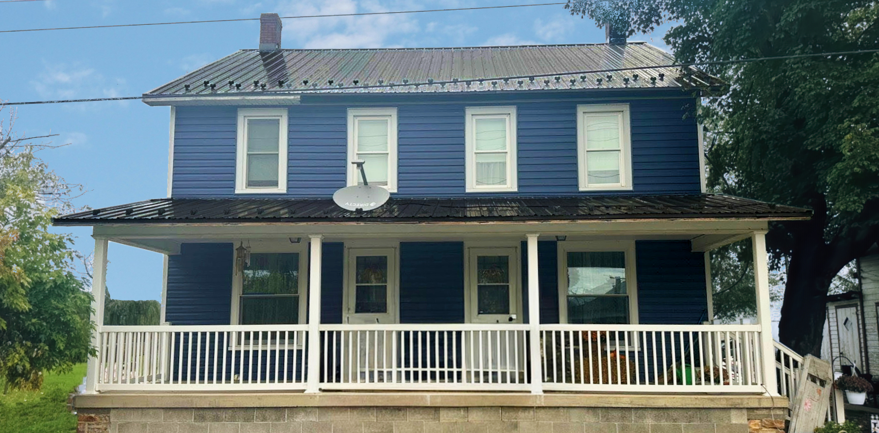 New vibrant blue vinyl siding